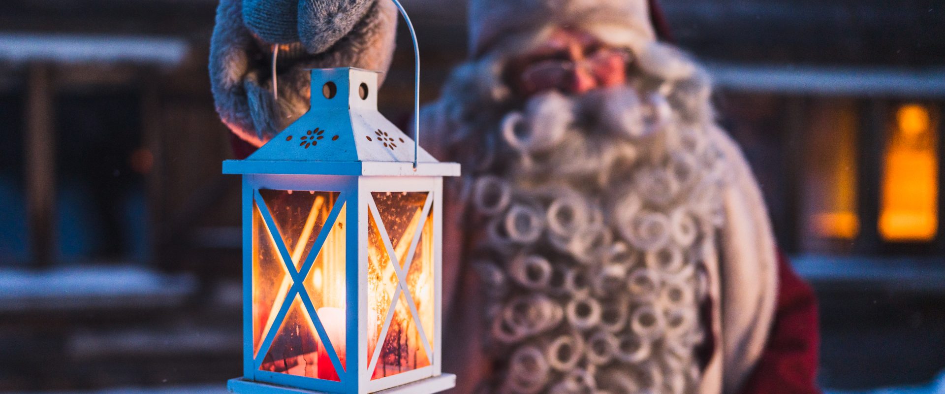 santa with lantern in lapland